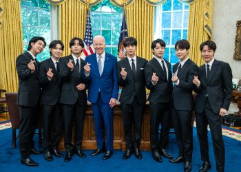 President Joe Biden records a digital address with the singing group BTS Tuesday, May 31, 2022, in the Oval Office of the White House.