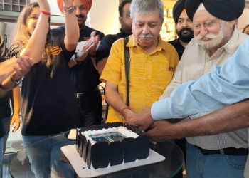 Cake Cutting ceremony by Senior Journalist at Harley Davidson Showroom